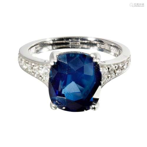 A sapphire and diamond set ring Ring size: M, estimated total gem weights: sapphire 6.07cts, diamonds 0.44cts