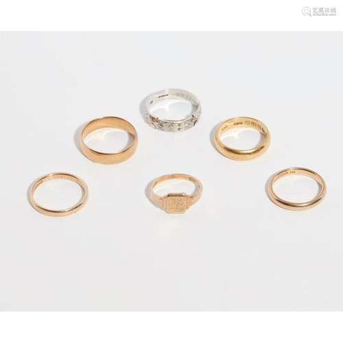 A collection of gold bands