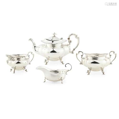 Y A three piece tea service Height of teapot: 15cm, weight: 40oz