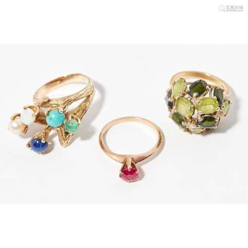 A collection of three gem set rings Ring sizes: M, N & N