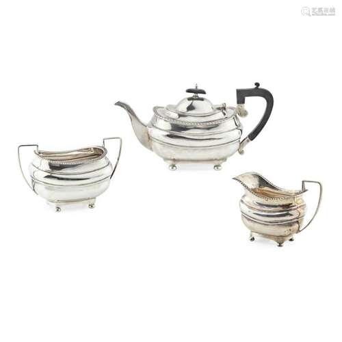 A modern three piece silver tea service Height: 16cm, weight (all in): 41oz