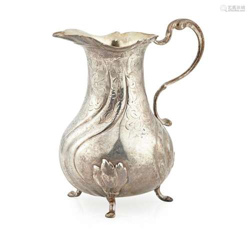 A continental European cast cream jug Height: 12cm, weight: 5.9oz