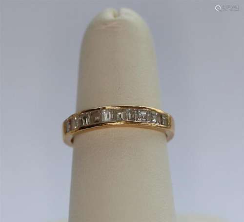 A diamond set half-eternity ring Ring size: L