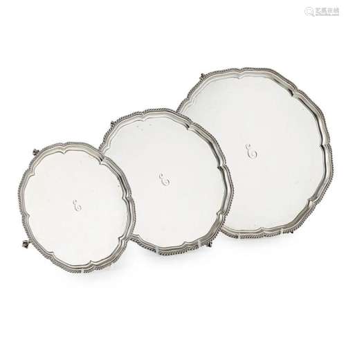 A matched set of three graduated salvers Width: 31cm & 24.5cm, 20cm, combined weight: 60oz