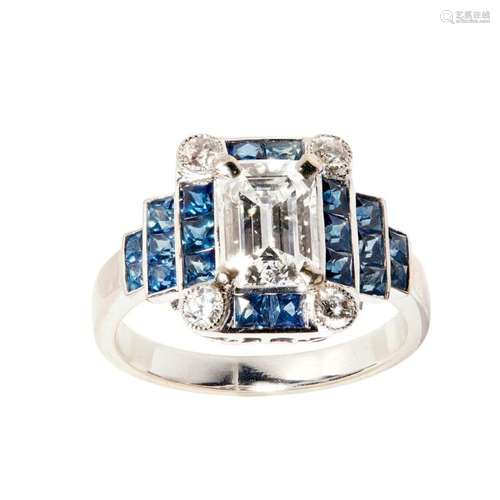 A diamond and sapphire cluster ring Ring size: M, principal diamond weight: 1.21cts