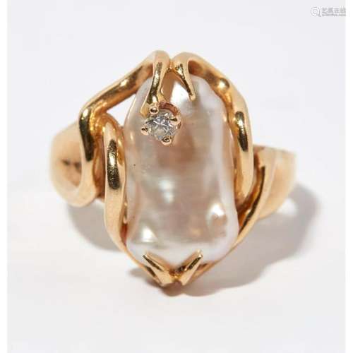 A pearl and diamond set ring Ring size: K