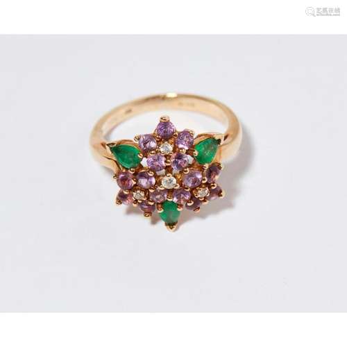 A multi-gem set cluster ring Ring size: M/N