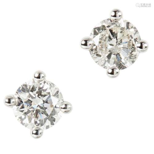 A pair of diamond set stud earrings Estimated total diamond weight: 0.75cts