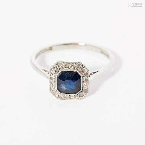 A sapphire and diamond set cluster ring Ring size: N