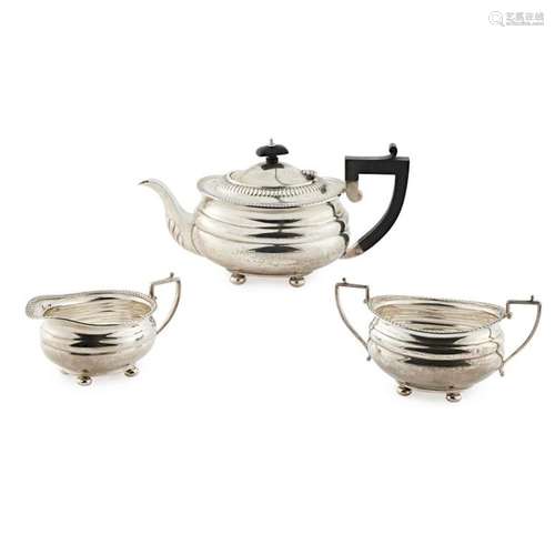 A modern three piece tea service Height of teapot: 16cm, weight (all in): 30.97oz