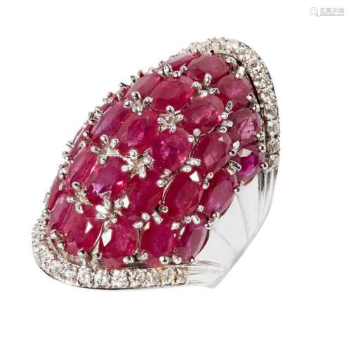 A large modern ruby and diamond set dress ring Ring size: K/L, length of centre front: 37mm