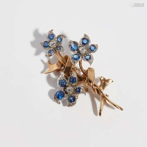 A sapphire and diamond set floral spray brooch Length: 54mm