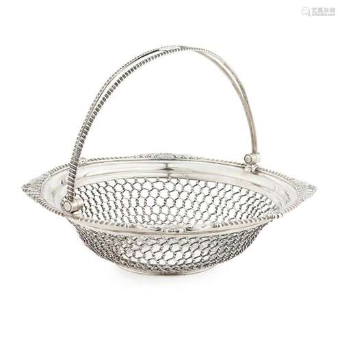 An unusual George III swing handled basket Diameter: 27cm, weight: 31oz