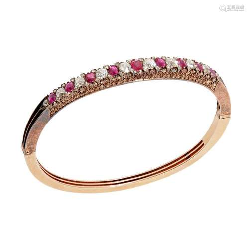 A ruby and diamond set hinged bangle Internal diameter: 57mm