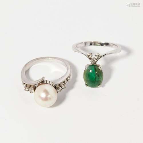 An emerald and diamond set wishbone ring Ring size: N, M