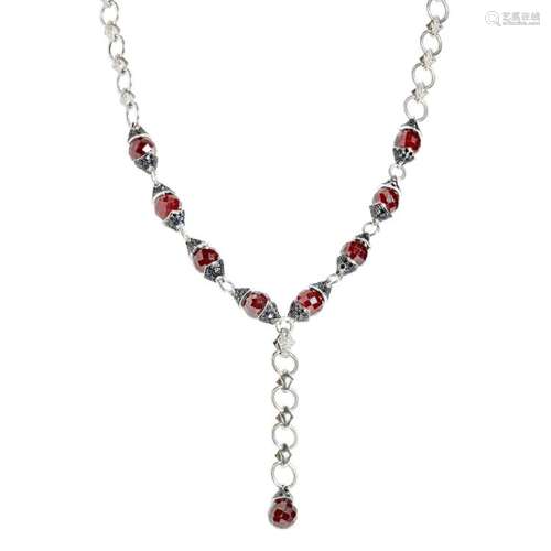 An 18ct white gold garnet and sapphire set necklace, Stephen Webster Length: 44cm