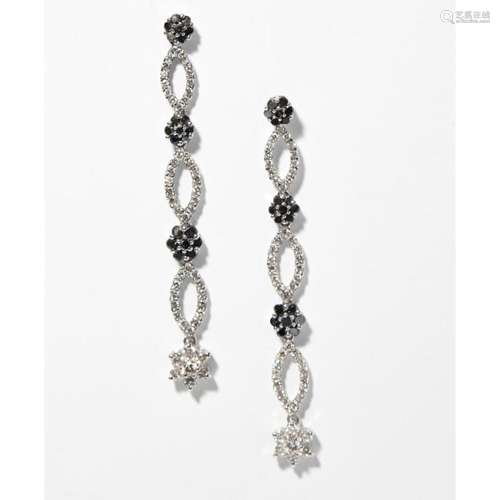 A pair of colourless and black diamond set earrings Length: 57mm