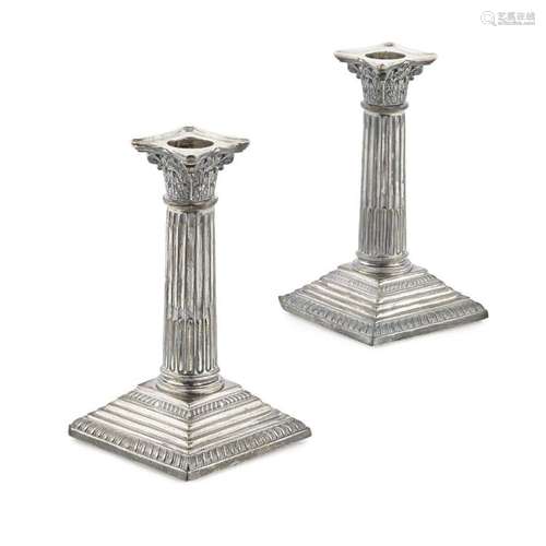 A pair of Corinthian column candlesticks Height of teapot: 13.5cm, weight: 32oz