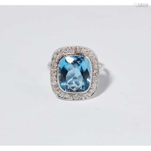 An aquamarine and diamond set cluster ring Ring size: I, estimated aquamarine weight: 14.60cts