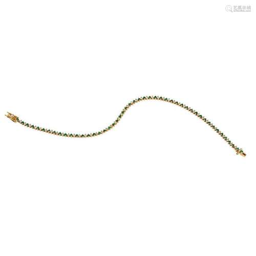 An emerald and diamond set line bracelet Length: 18cm