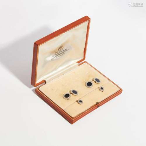 A pair of onyx and diamond set cufflinks Diameter of terminals: 13mm