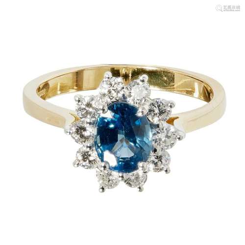 A sapphire and diamond set cluster ring Ring size: L, estimated total gem weights: sapphire 1.17cts, diamonds 0.51cts