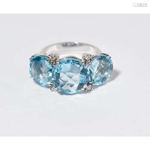 A large aquamarine and diamond set dress ring Ring size: O