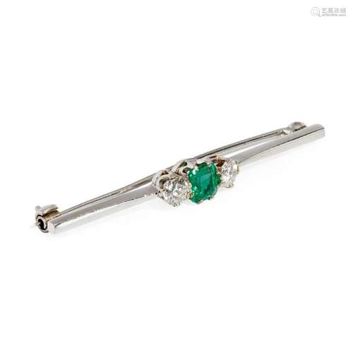 An emerald and diamond set bar brooch Length: 53mm, estimated total gem weights: emerald 0.70cts, diamonds 0.50cts