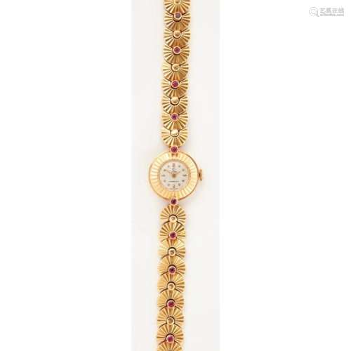An 18ct gold and ruby set lady's wrist watch, Cyma Case diameter: 17mm, dial diameter: 10mm