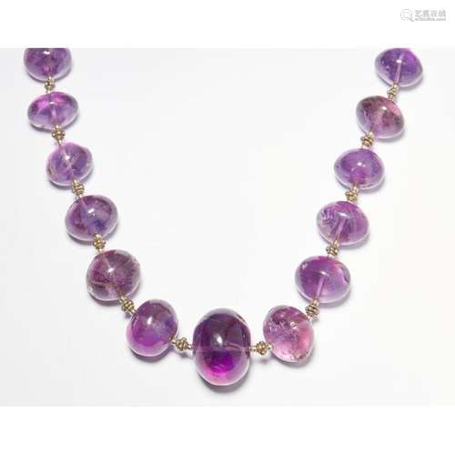 A large amethyst bead necklace Length: 64cm, diameter of beads: 15mm- 27mm