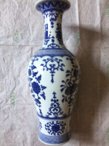 a blue and white vase