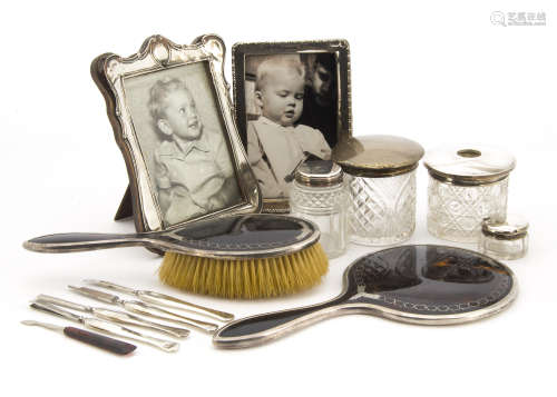 A collection of Victorian and later silver and other dressing table items
