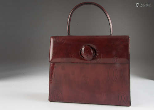 A modern leather handbag by Cartier