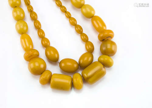 Two Art Deco period amber style bead necklaces