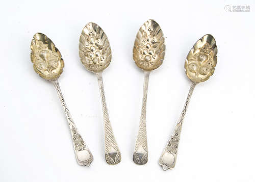 Two pairs of early 19th Century silver berry serving spoons