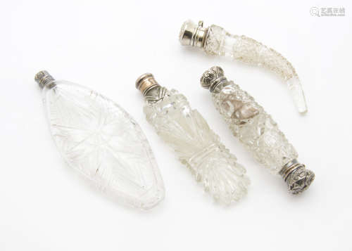 Four Victorian and later cut glass scent bottles