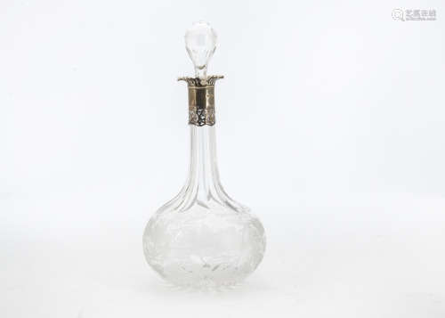 A late Victorian glass and silver mounted claret decanter by William Hutton & Sons