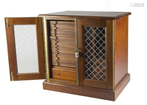 A modern mahogany coin cabinet by Peter Nichols