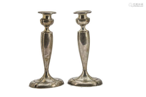 A pair of Art Deco American silver filled candlesticks