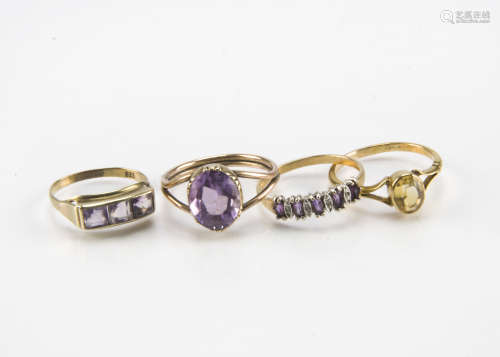 Four vintage and modern gold and gem set rings