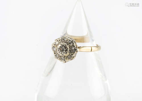 An Art Deco period 18ct gold and diamond cluster ring