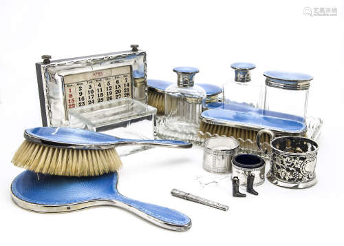 An Art Deco period silver and enamel dressing table set