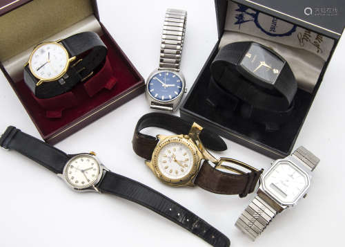 A collection of vintage and modern wristwatches