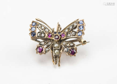 A sweet Victorian gold and gem set butterfly pendant cum brooch