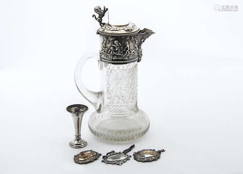 A nice Edwardian cut glass and silver plated claret jug