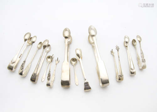A collection of Victorian and later silver and silver plated sugar tongs
