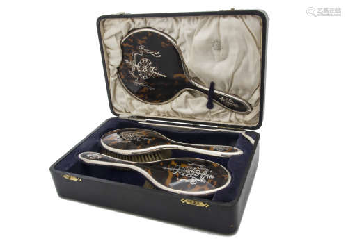 A late Victorian cased silver and tortoiseshell dressing table set