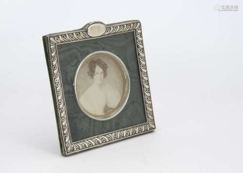 An Edwardian silver and green velvet photograph frame                                                                                                                                                          Jewellery