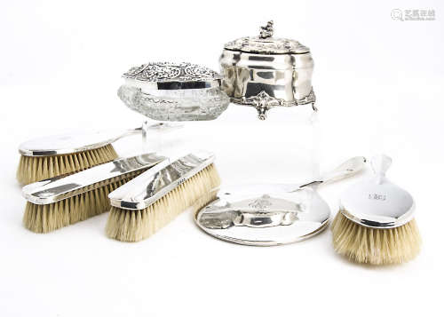 A George V five piece silver dressing table set