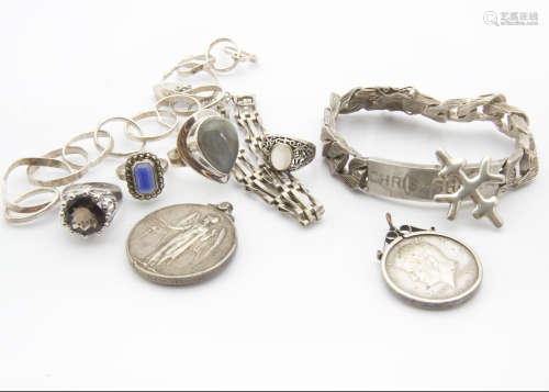 A collection of silver and white metal jewellery and other items